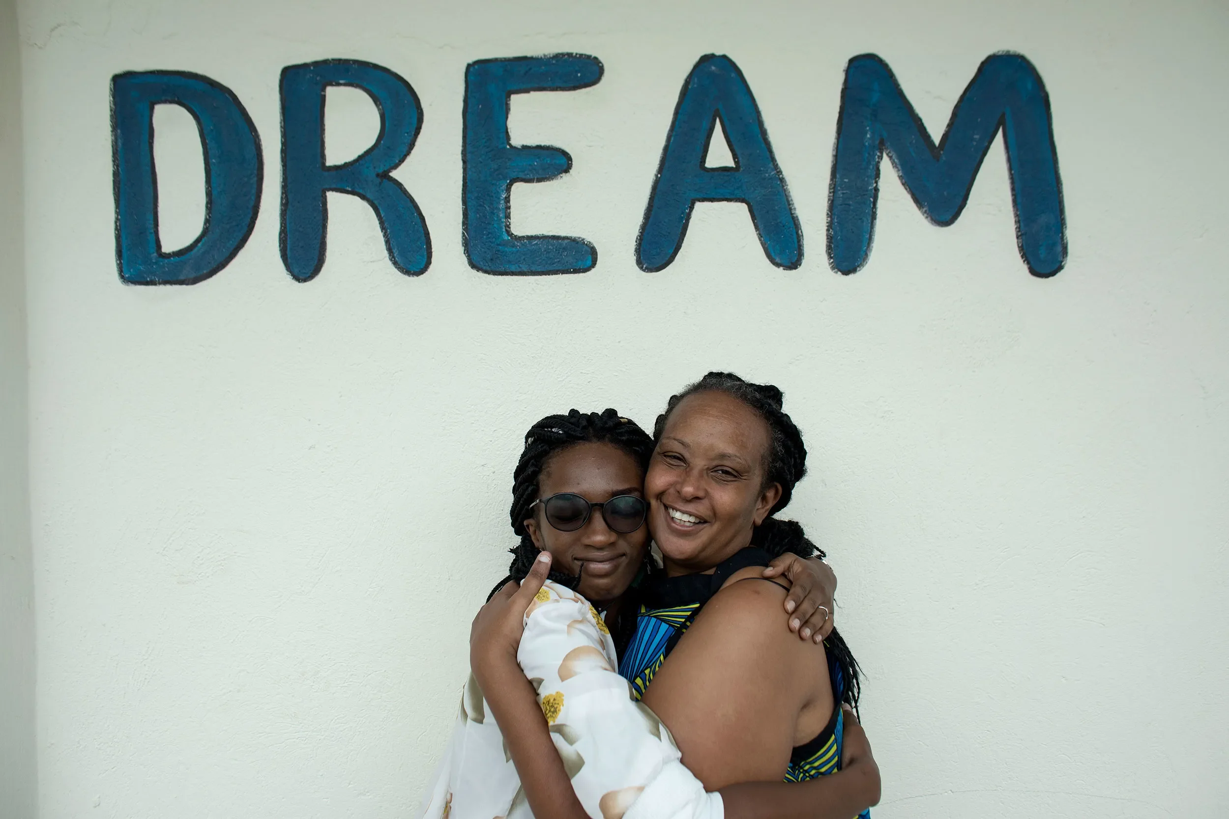 Dominique (left) and Patrice share a deep bond.